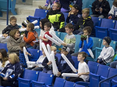 Young fans watch the WHL's Saskatoon Blades and their provincial rivals the Prince Albert Raiders renew their rivalry for the 2016-17 season in Saskatoon, October 6, 2016.