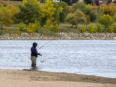 Cory Craig had the swimmers' beach on Spadina Crescent all to himself with the colder weather to do a bit of fishing,  September 12, 2016.