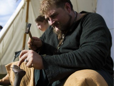 Jamin Schumacher makes a Brass Serpent Ring during the Prairie Paladin Medieval Market and Faire located at the University of Saskatchewan in Saskatoon, October 1, 2016.