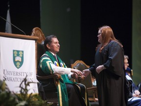 Blaine Favel shakes hands with newly graduated U of S students during Fall Convocation at TCU Place in Saskatoon, Saskatchewan on Saturday, October 22nd, 2016.
