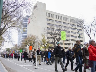 A crowd marches downtown in light of the recent cuts to the Lighthouse facility in Saskatoon, October 22, 2016.