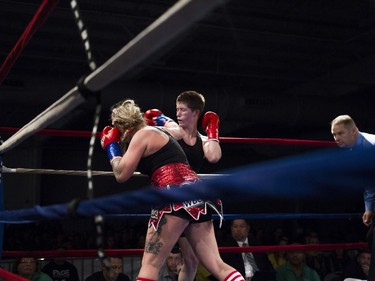 Michelle Nelson (R) squares off against at Stephanie Essensa during the 125-pound match at Prairieland Park in Saskatoon, October 22, 2016.