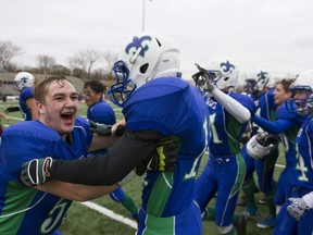 David Lett celebrates with his team after defeating the Marion Graham Falcons during the Saskatoon 3A high school football finals at SMF Field  in Saskatoon, Oct. 29, 2016.
