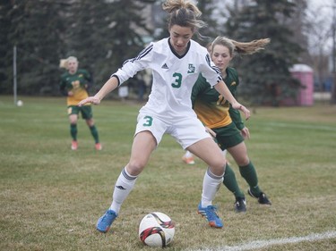 U of S Huskies #3 Ella Molnar defends the ball against a Regina Cougars player during the game at the University of Saskatchewan in Saskatoon, October 29, 2016.