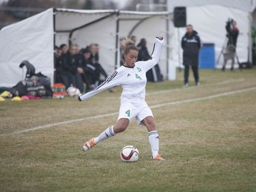 U of S Huskies #4 Taneil Gay kicks the ball towards the Regina Cougars' net during the game at the University of Saskatchewan in Saskatoon, October 29, 2016.