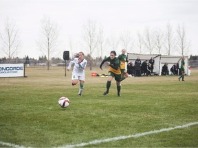 #6 Jackson Wiegers chases after the ball beside #13 Shayla Kapila of the Cougars during the game held at the University of Saskatchewan in Saskatoon, Saskatchewan on Saturday, October 29th, 2016. (Kayle Neis/Saskatoon StarPhoenix)