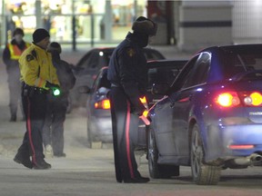 Saskatoon police perform a roadside check looking for impaired drivers