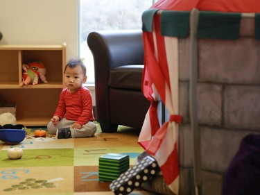 Eli Wang Tang sits in the baby room during the official opening of the newest during the official opening of the newest USSU childcare centre at the McEown location in Saskatoon on October 17, 2016.