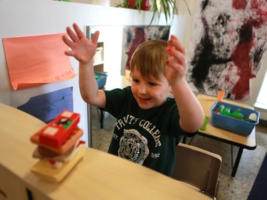 Jackson Fisher serves up a sandwich in his food truck in the Firefly room during the official opening of the newest USSU childcare centre at the McEown location in Saskatoon on October 17, 2016.