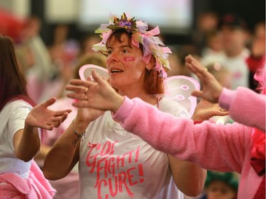 Sandra Wiebe warms up at Canadian Breast Cancer Foundation's CIBC Run for the Cure at Prairieland Park in Saskatoon on October 2, 2016.