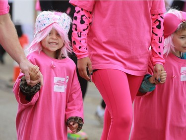 Vittoria Cunningham walks with her family at Canadian Breast Cancer Foundation's CIBC Run for the Cure at Prairieland Park in Saskatoon on October 2, 2016.