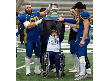 The Saskatoon Hilltops celebrate their Prairie Football Conference championship game win against the Calgary Colts at SMF field in Saskatoon on October 30, 2016.