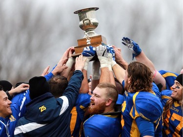 The Saskatoon Hilltops celebrate their Prairie Football Conference championship game win against the Calgary Colts at SMF field in Saskatoon on October 30, 2016.