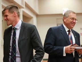 Mayoral candidates Charlie Clark and Don Atchison introduce themselves to guests at a Mayor's forum at Luther Heights in Saskatoon on October 5, 2016.