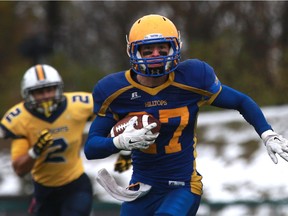 Saskatoon Hilltops' Des Vessey runs with the ball during their game against the Edmonton Wildcats game at SMF Field at Gordie Howe Bowl in Saskatoon on Oct. 9, 2016.