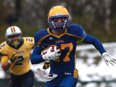 Saskatoon Hilltops' Des Vessey runs with the ball during their game against the Edmonton Wildcats at SMF Field at Gordie Howe Bowl in Saskatoon on October 9, 2016.