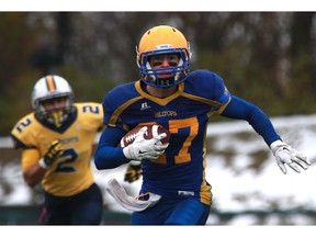 Saskatoon Hilltops' Des Vessey runs with the ball during their game against the Edmonton Wildcats game at SMF Field at Gordie Howe Bowl in Saskatoon on October 9, 2016. (Michelle Berg / The StarPhoenix)