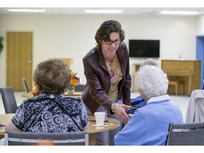 Saskatoon Mayoral candidate Kelley Moore speaks with residents of St. Volodymyr Villa during a campaign stop , Monday, October 03, 2016.
