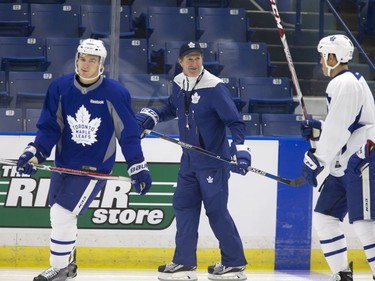 Coach Mike Babcock (C) of the Toronto Maple Leafs during a pre-game skate at SaskTel Centre before facing the Ottawa Senators, October 4, 2016.