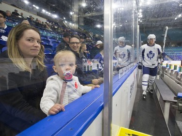 Hockey fans Erynne Berg and 15-month-old daughter Rachel Berg were on hand to watch the Toronto Maple Leafs' pre-game skate at SaskTel Centre before facing the Ottawa Senators, October 4, 2016.