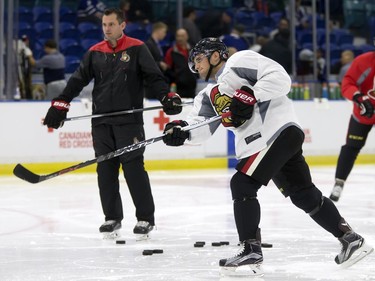 Chris Wideman of the NHL Ottawa Senators takes dome shots during a pre-game skate at SaskTel Centre before an evening game against the Toronto Maple Leafs, October 4, 2016.