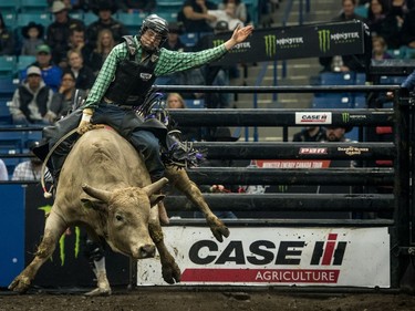 Brady Oleson rides a bull during the Professional bullriding Canadian final at SaskTel Centre in Saskatoon, October 15, 2016.