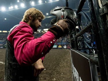 Wacey Finkbeiner after his ride during the Professional bullriding Canadian final at SaskTel Centre in Saskatoon, October 15, 2016.