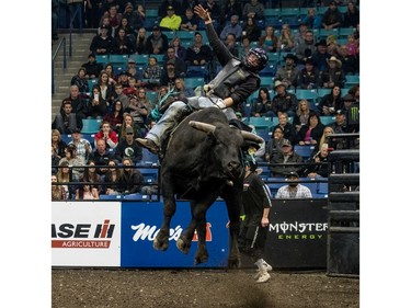 Wacey Finkbeiner rides a bull during the Professional bullriding Canadian final at SaskTel Centre in Saskatoon, October 15, 2016.