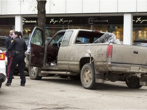 A police pursuit of a truck in downtown Saskatoon ended with one person in custody after the vehicle crashed in front of the Bessborough Hotel at Spadina Crescent East and 21st Street East on Oct. 17, 2016 (Greg Pender / The Saskatoon StarPhoenix)