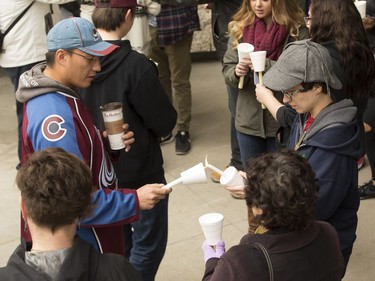 People attend a candlelight vigil outside the Gordon Oakes Red Bear Student Centre on the University of Saskatchewan campus to support those affected by the tragedies of youth suicides in northern Saskatchewan, October 20, 2016.