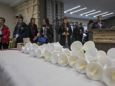 People attend a candlelight vigil outside the Gordon Oakes Red Bear Student Centre on the University of Saskatchewan campus to support those affected by the tragedies of youth suicides in northern Saskatchewan, October 20, 2016.