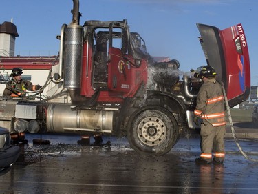 Firefighters extinguished a full involved semi truck fire on eastbound Circle Drive near Airport Drive, which shut down traffic, October 21, 2016.