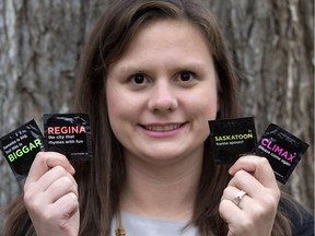 Saskatoon Sexual Health Centre executive director Jillian Schwandt poses Tuesday, October 25, 2016 with condoms which are part of the recently launched 'WrapItUpSK' campaign. As part of the campaign, the SSHC is partnering with several organizations in Saskatoon in an attempt to break an unofficial record for the most people tested for STIs in a 12-hour period.
