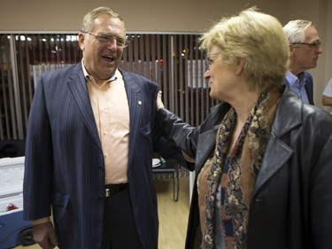 Don Atchison gets some support from Kathy Weber in his campaign headquarters while waiting on the results of the civic election, October 26, 2016.