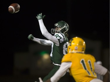 U of S Huskies' Mitch Hillis can't quite come down with the reception against the University of Alberta Golden Bears during CIS football action at Griffiths Stadium in Saskatoon, October 28, 2016.