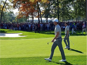 Thomas Pieters (foreground) and Rory McIlroy on Saturday at Hazeltine Country Club. (Photo by John Grainger)