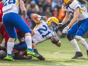 2016 Canadian Bowl offensive MVP Logan Fischer ran the ball 28 times for 202 yards and caught two passes for 43 yards and two touchdowns as the Saskatoon Hilltops defeated the Westshore Rebels 37-25 in Langford, B.C.