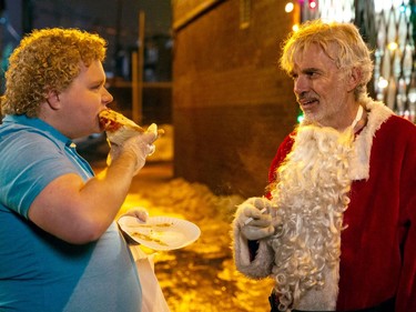 Brett Kelly (L) and Billy Bob Thornton star in "Bad Santa 2."