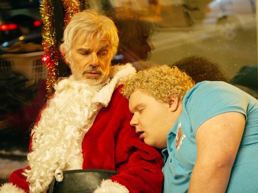 Billy Bob Thornton (L) and Brett Kelly star in "Bad Santa 2."