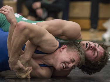 University of Saskatchewan Huskies wrestler Thomas Johnston takes on Cat Town Wrestling Club wrestler Jacon Hall during the Huskies Open wrestling at the Education Building on the U of S campus in Saskatoon, November 26, 2016.