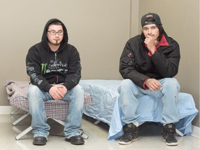 Charles Neil Curly (L) and Jeremy Roy, who have been living at the Lighthouse homeless shelter in North Battleford, boarded a bus to British Columbia on March 8, 2016.