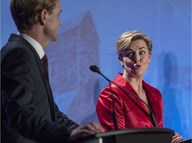 Conservative leadership candidate Kellie Leitch (R) agrees with a statement by Chris Alexander during the Conservative leadership debate in Saskatoon, November 9, 2016.