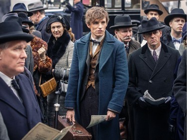 Eddie Redmayne (C) stars in "Fantastic Beasts and Where to Find Them."