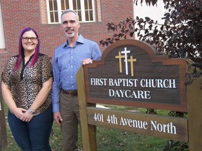 Rev. Paul Matheson, right, pastor of First Baptist Church, and Janice Leason, director of First Baptist Church Daycare which celebrated its 50th anniversary recently with an Open House. Photo by Darlene Polachic.