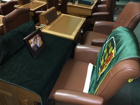 Saskatchewan Party MLA Roger Parent's chair is shown in the Legislative assembly in Regina on Nov. 30, 2016, a day after he died