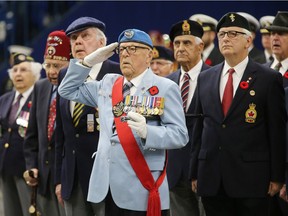 Members of the Old Guard stand at attention during last year's Remembrance Day ceremonies at SaskTel Centre.