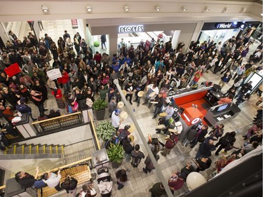 A flash mob broke out in Midtown Plaza in Saskatoon, singing at the top of their lungs in protest, making sure Mother Earth is protected and there is always safe water to drink, November 3, 2016.