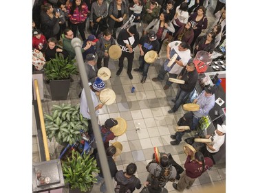A flash mob broke out in Midtown Plaza in Saskatoon, singing at the top of their lungs in protest, making sure Mother Earth is protected and there is always safe water to drink, November 3, 2016.