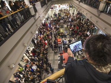 A flash mob broke out in Midtown Plaza in Saskatoon, singing at the top of their lungs in protest, making sure Mother Earth is protected and there is always safe water to drink, November 3, 2016.