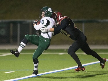 Holy Cross Crusaders running back #3 Michael Letts catches a touchdown on the goal line to take the lead against the Centennial Chargers at the Saskatoon High School Football 4A City Final, November 4, 2016.